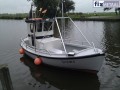 Damjolle vissersboot met buiskoppelingen van Fixmetaal