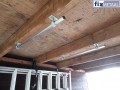 Buizen voor het ophangen van een dakkoffer in de garage! Eenvoudig te maken met Leuningdragers van Fixmetaal.